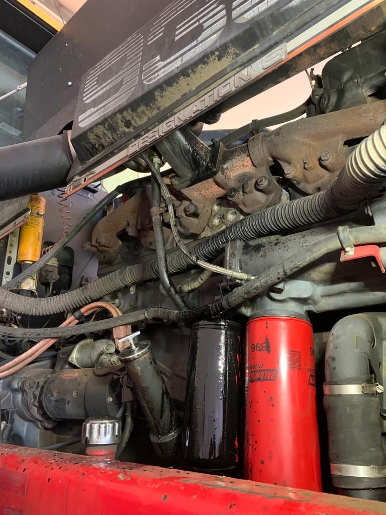 Heavy-duty engine bay during a diagnostic repair