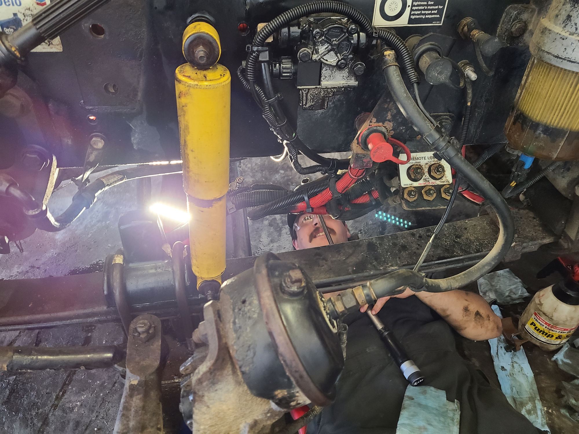 Underside brake and suspension inspection on a commercial vehicle