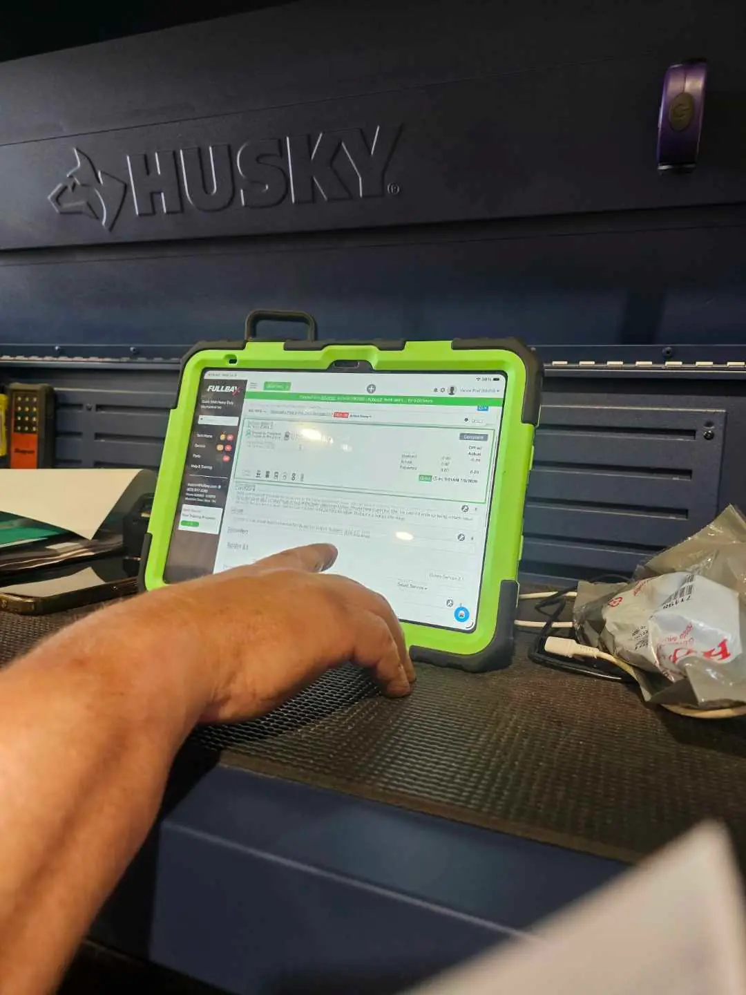 Green cased tablet running Fullbay